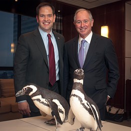 Blackstone Chairman and CEO Steve Schwarzman (right) poses with their aquatic visitors. (image from Blackstone Group) Blackstone Chairman and CEO Steve Schwarzman (right) poses with their aquatic visitors. (image from Blackstone Group)